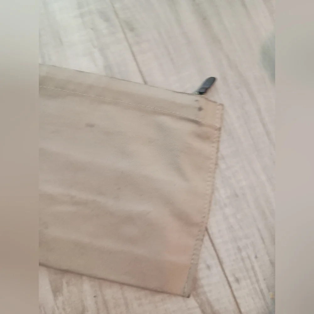 LOUIS VUITTON Truth Voyage Pouch Beige Monogram Polyester